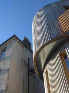 Corrugated curvy concrete exterior walls image2